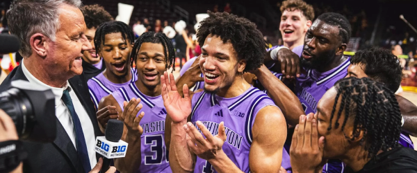UW Men's Basketball team being interviewed after a win